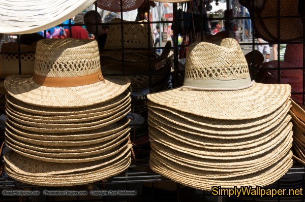 pile of straw hats