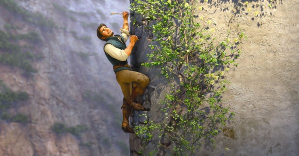 Flynn Rider climbing Rapunzel's tower from Disney's Tangled