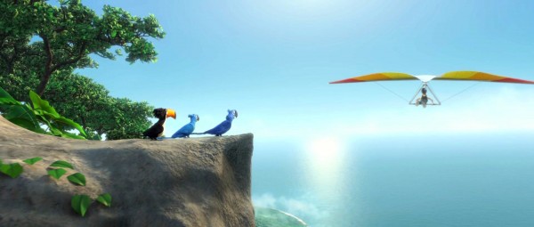 Rafael the toucan talks to Blu the macaw while Jewel looks on in a scene from the movie Rio