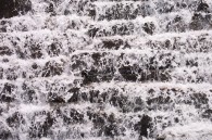 water cascading down a waterfall