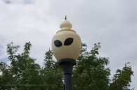 lamp post with alien eyes