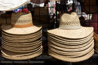 pile of straw hats