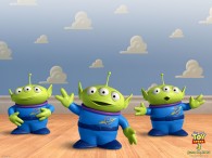 a group of little green men alien toys from toy story