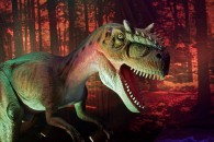 bipedal predator dinosaur with many sharp teeth, large head and long tail