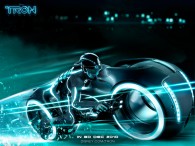 Sam Flynn riding the blue light cycle from Disney's Tron Legacy movie wallpaper