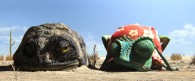 Rango the chameleon with a toad in the desert from the CG animated movie Rango wallpaper