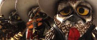 a group of owls dressed as players in a mariachi band from the CG animated movie Rango wallpaper