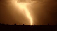 lightning strikes and flashes over the African savanna wallpaper